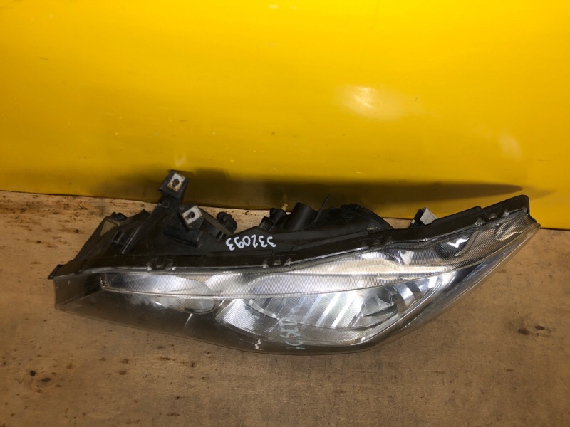 Фара левая CIVIC 4D 06-11