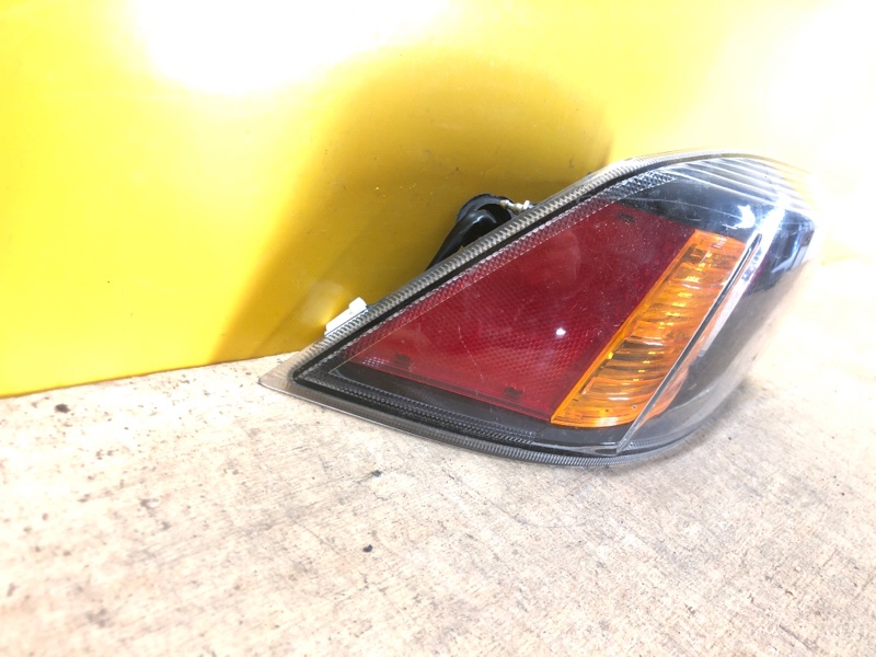 Фонарь наружный левый MITSUBISHI LANCER X 10 15-17