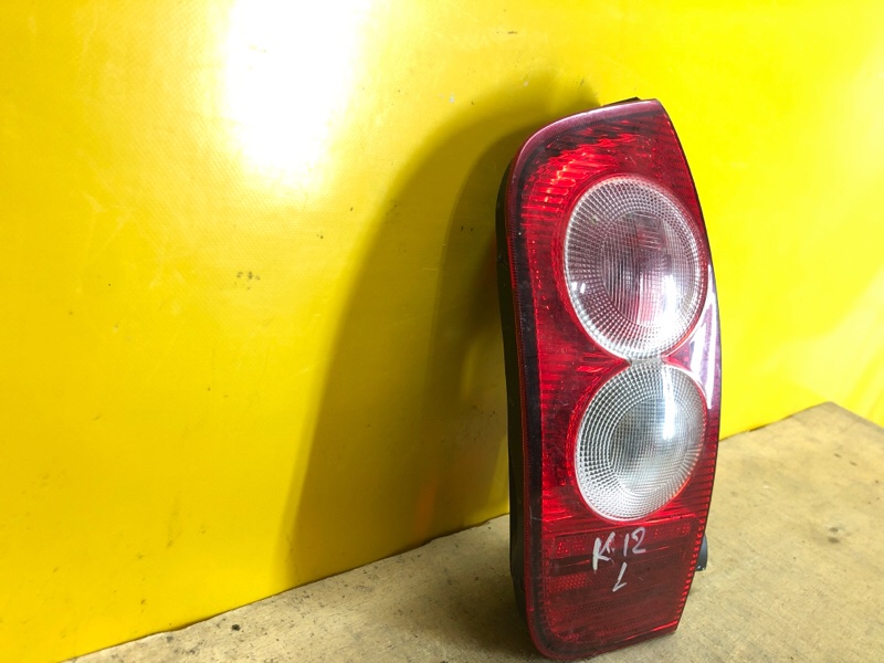 Фонарь наружный левый NISSAN MICRA 03-11