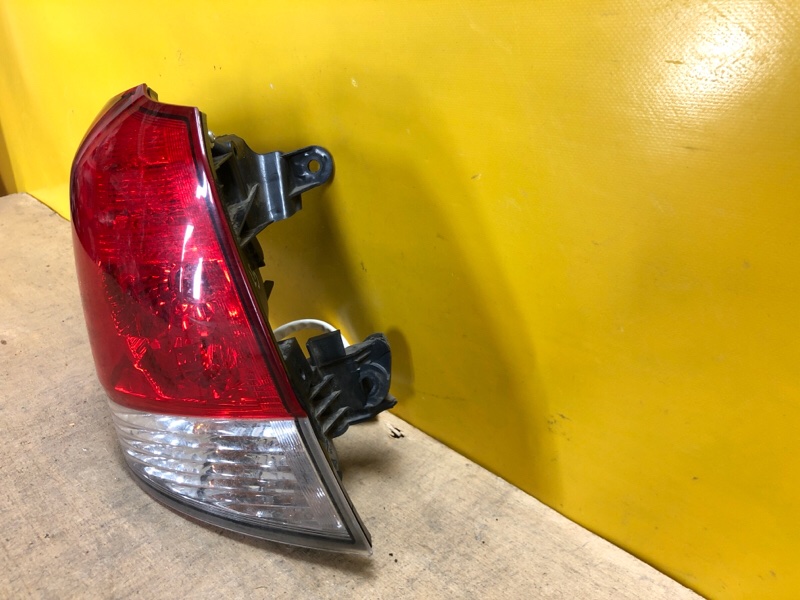 Фонарь наружный левый OUTBACK 09-14 BR