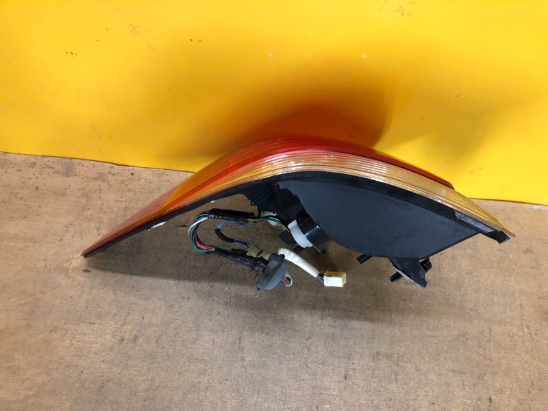 Фонарь наружный левый OUTBACK 09-14 BR