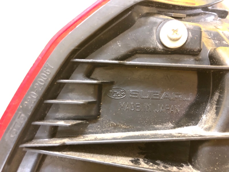 Фонарь наружный левый OUTBACK 09-14 BR