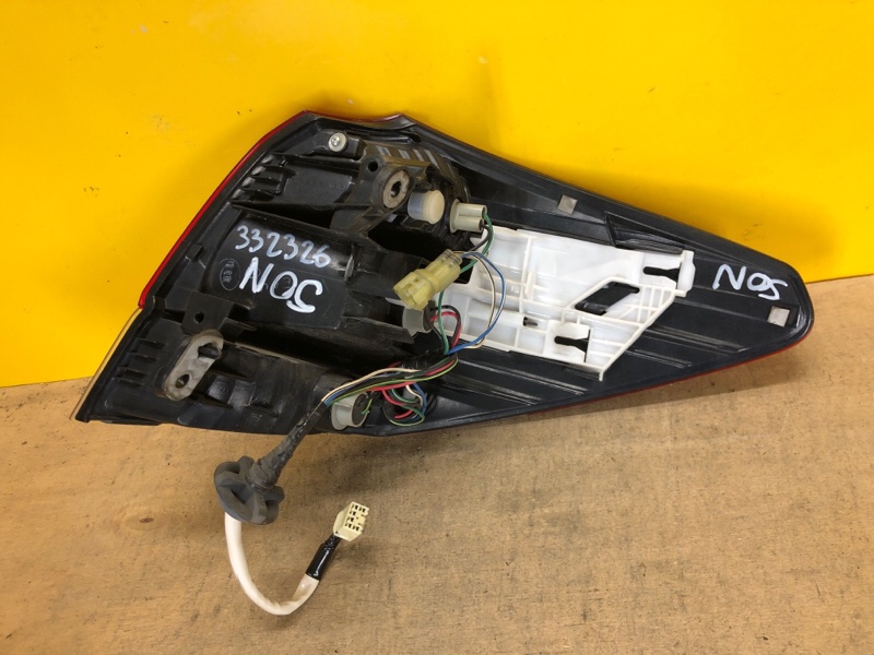 Фонарь наружный левый OUTBACK 09-14 BR