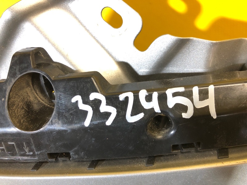 Кронштейн переднего бампера (на крыле) левый LEAF 18-