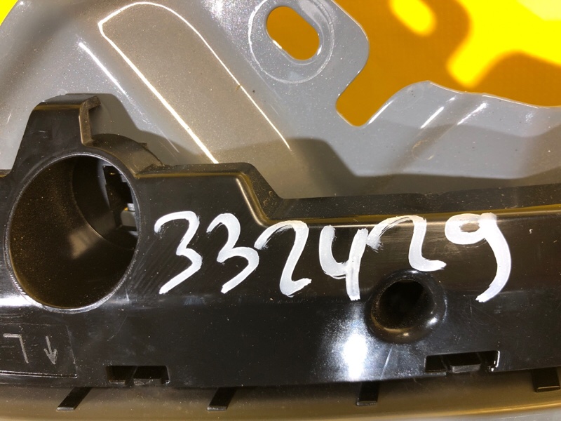 Кронштейн переднего бампера (на крыле) левый LEAF 18-