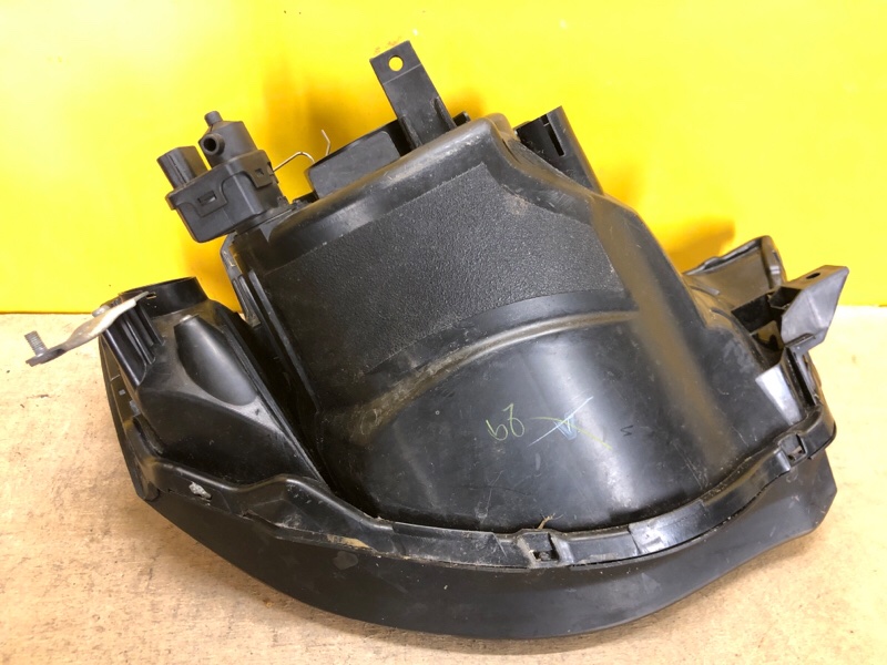 Фара левая L200 06-14