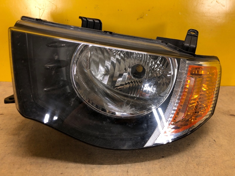 Фара левая MITSUBISHI L200 06-14 8301A691 Б/У