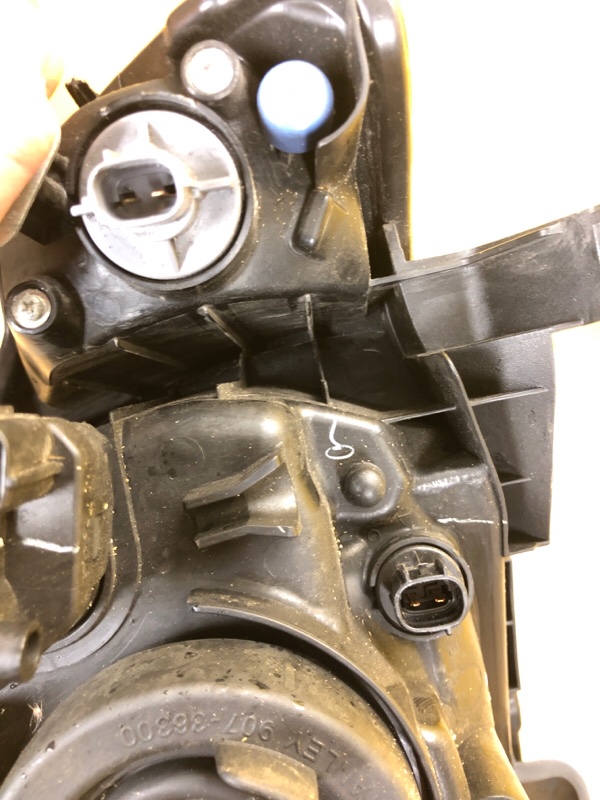 Фара левая L200 06-14