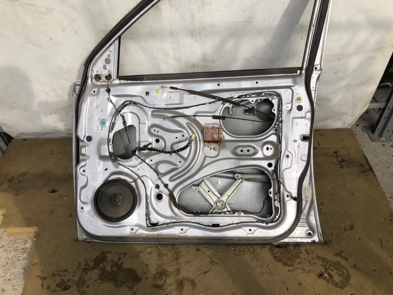 Дверь передняя правая L200 06-14