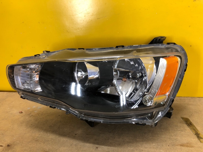 Фара левая MITSUBISHI LANCER X 10 07-15 Фара левая MITSUBISHI LANCER X 10 07-15