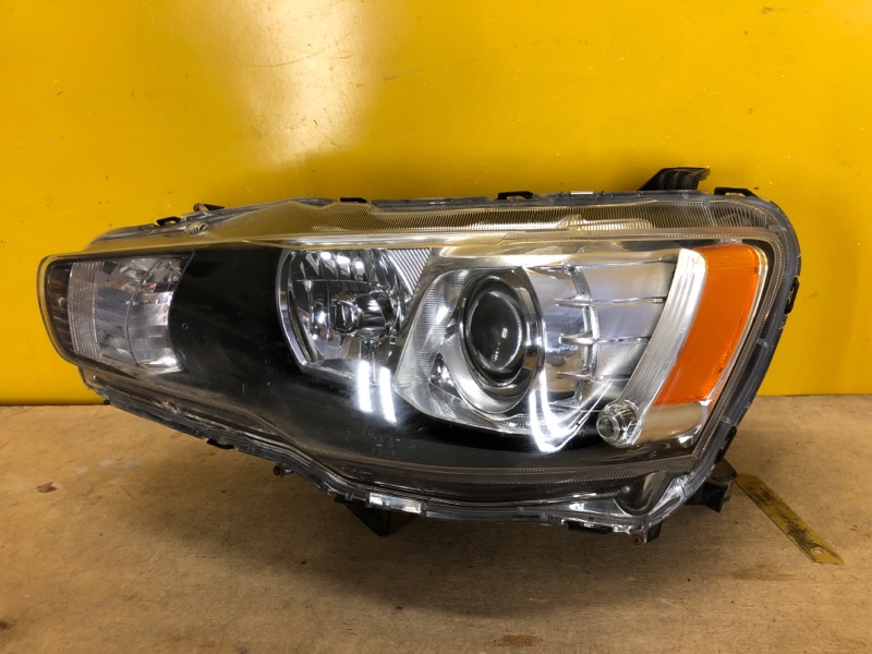 Фара левая MITSUBISHI LANCER X 10 07-15 Фара левая MITSUBISHI LANCER X 10 07-15