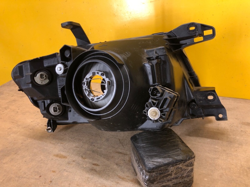 Фара левая PAJERO 99-06