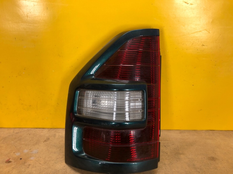 Фонарь наружный левый MITSUBISHI PAJERO 99-06 MR563841 Б/У