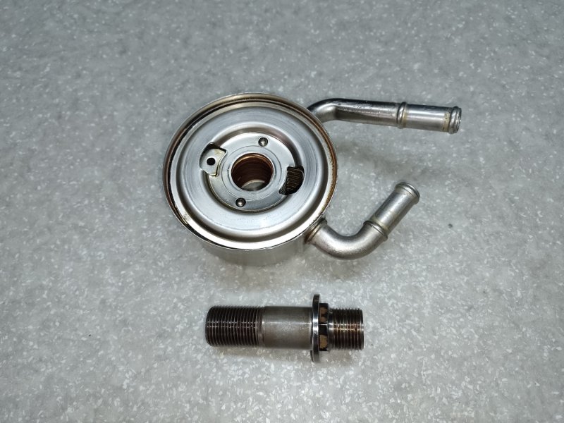 Теплообменник масляного фильтра NV200 USA 13- 2018 2.0 MR20DE