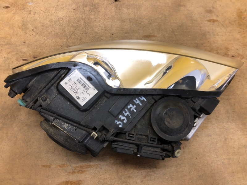 Фара левая TOUAREG 02-10