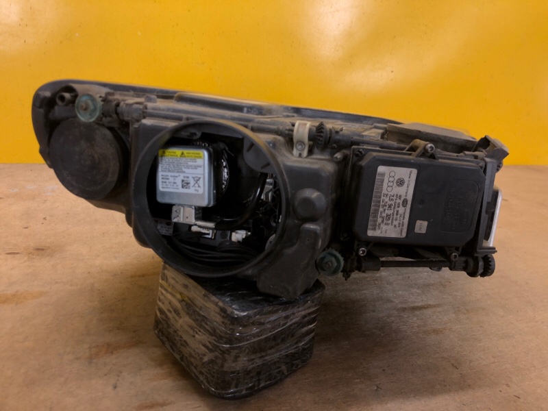 Фара левая TOUAREG 02-10