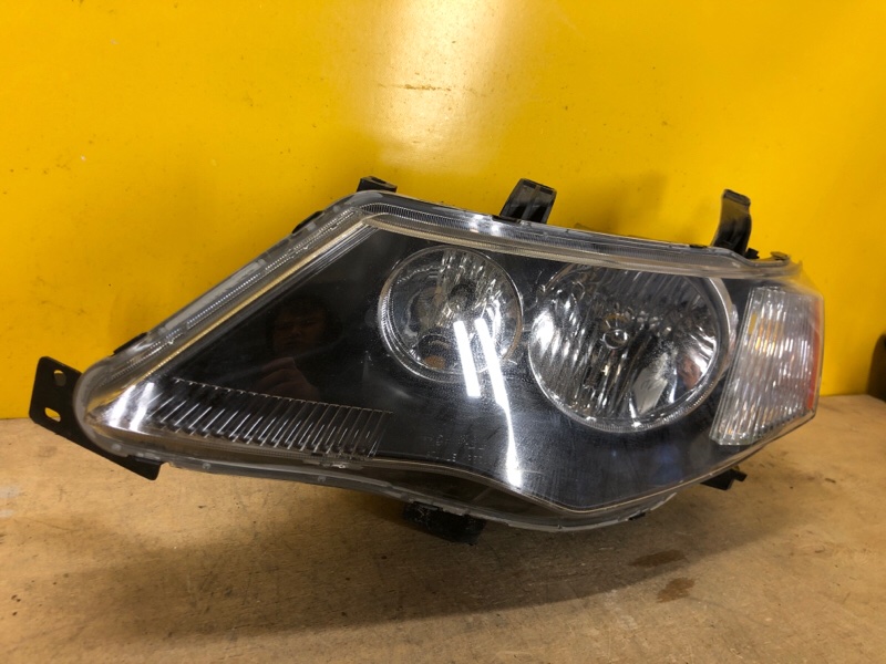 Фара левая MITSUBISHI OUTLANDER XL 05-13