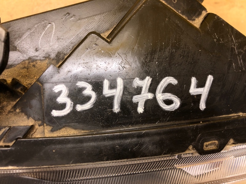 Фара левая OUTLANDER XL 05-13