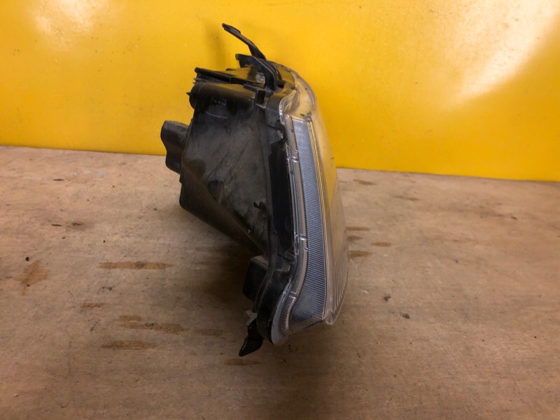 Фара левая OUTLANDER XL 05-13