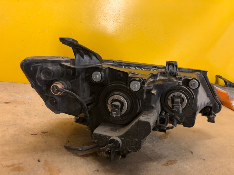 Фара левая OUTLANDER XL 05-13