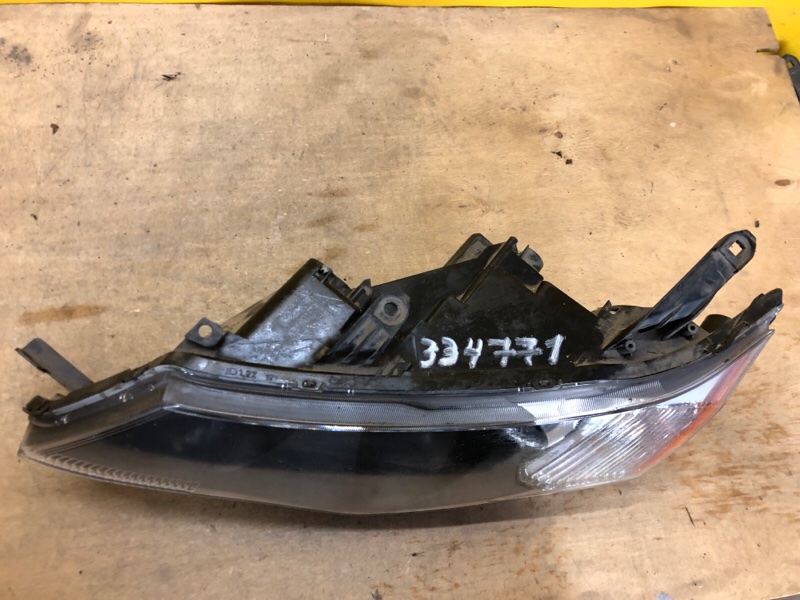 Фара левая OUTLANDER XL 05-13