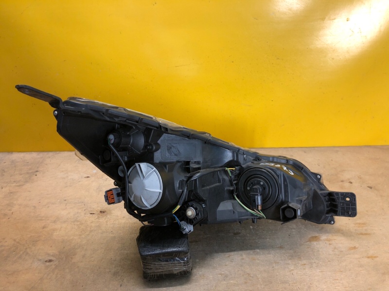 Фара левая OUTBACK 09-14 BR