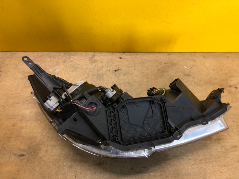 Фара левая OUTBACK 09-14 BR