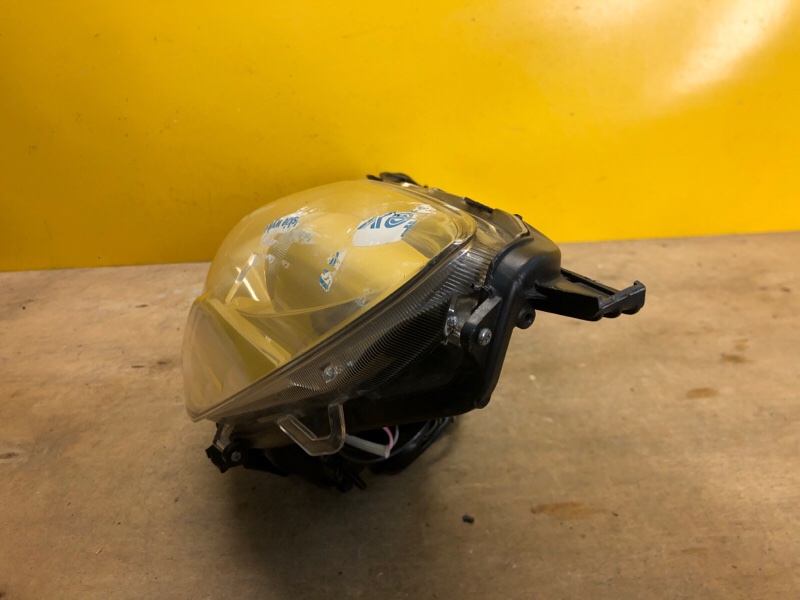 Фара левая OUTBACK 09-14 BR