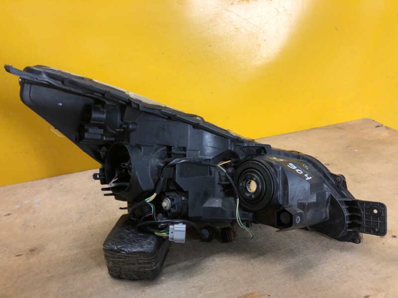 Фара левая OUTBACK 09-14 BR