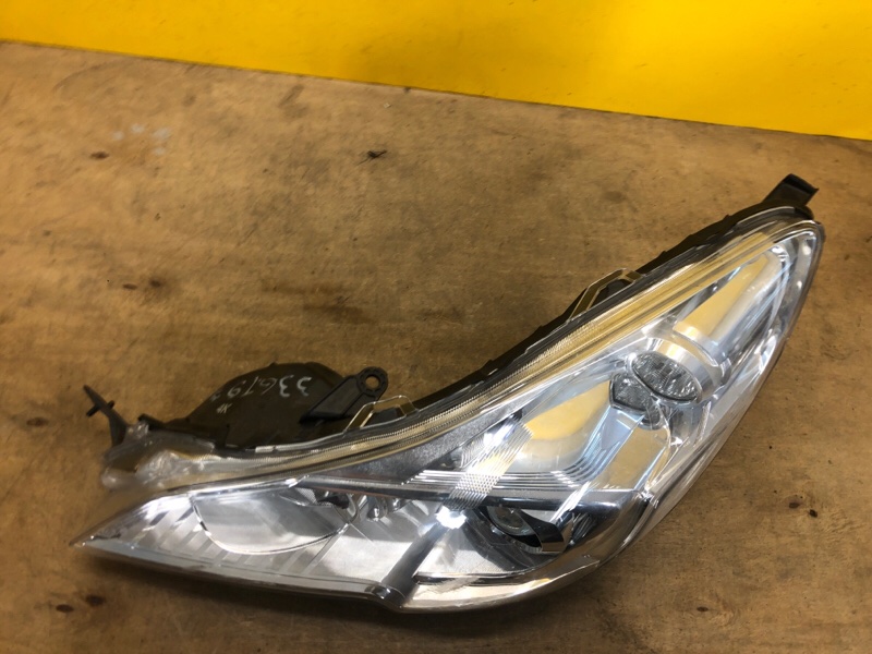 Фара левая OUTBACK 09-14 BR