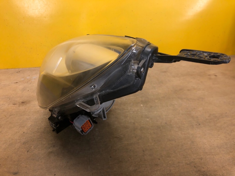 Фара левая OUTBACK 09-14 BR