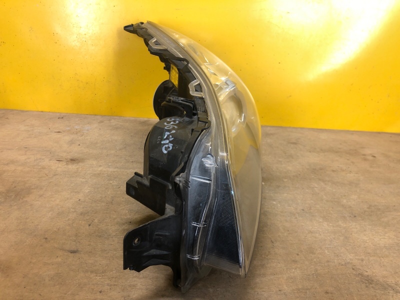 Фара левая OUTBACK 09-14 BR
