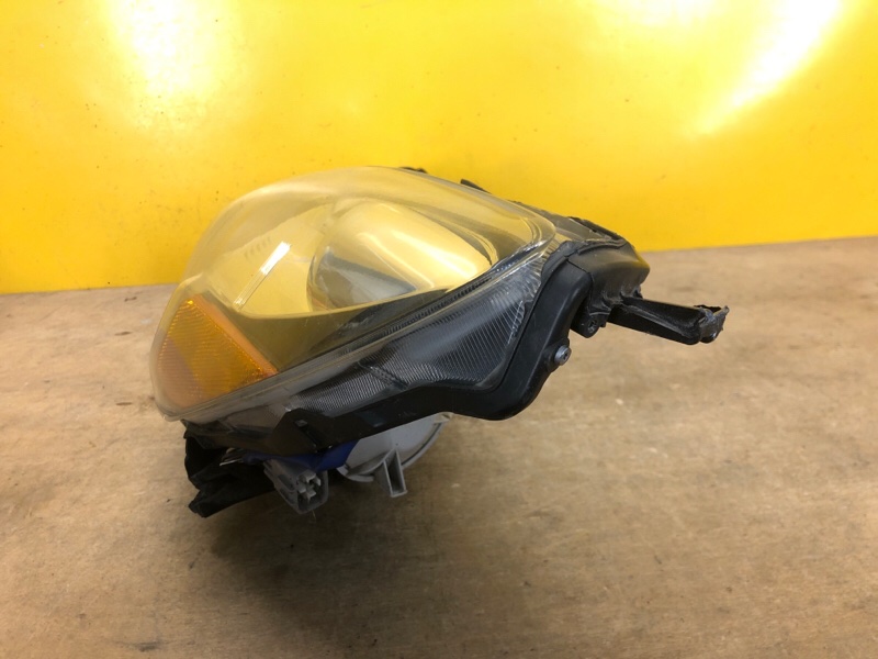 Фара левая OUTBACK 09-14 BR