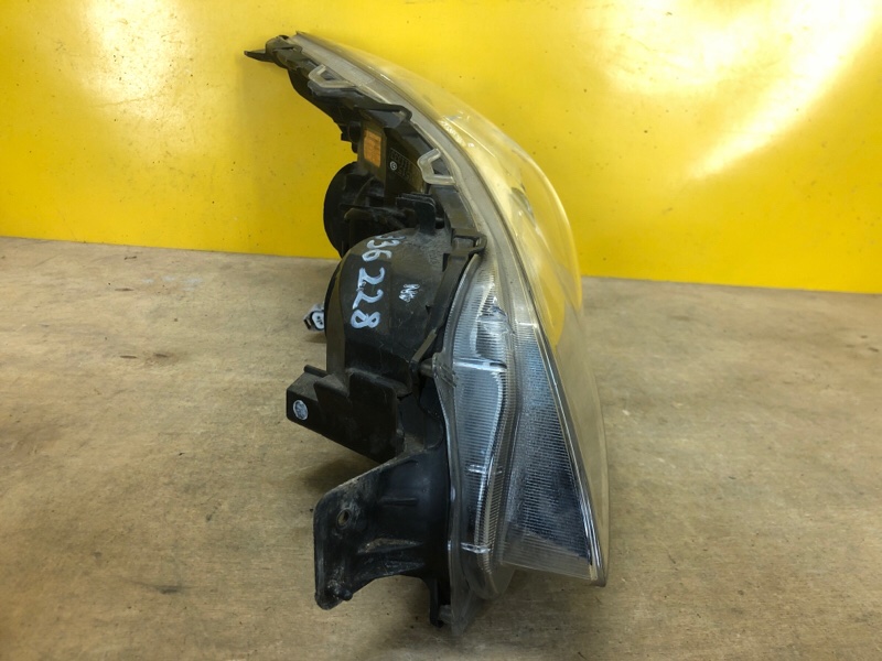 Фара левая OUTBACK 09-14 BR