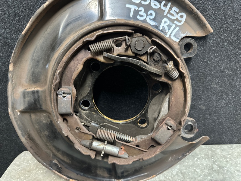 Тормозной механизм задний левый NISSAN X-TRAIL/ROGUE T32 13-20