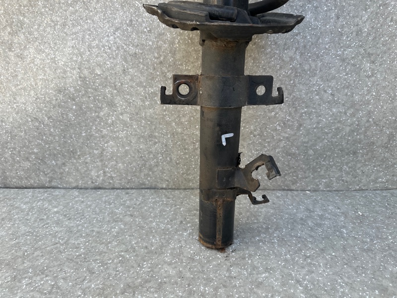 Амортизатор передний левый NISSAN X-TRAIL/ROGUE T32 13-20