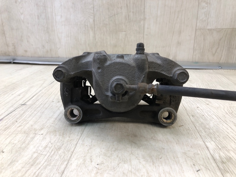 Суппорт тормозной передний правый SENTRA B17 12-21