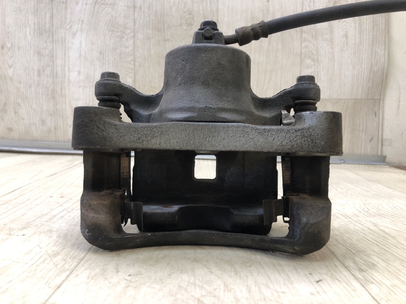 Суппорт тормозной передний правый SENTRA B17 12-21