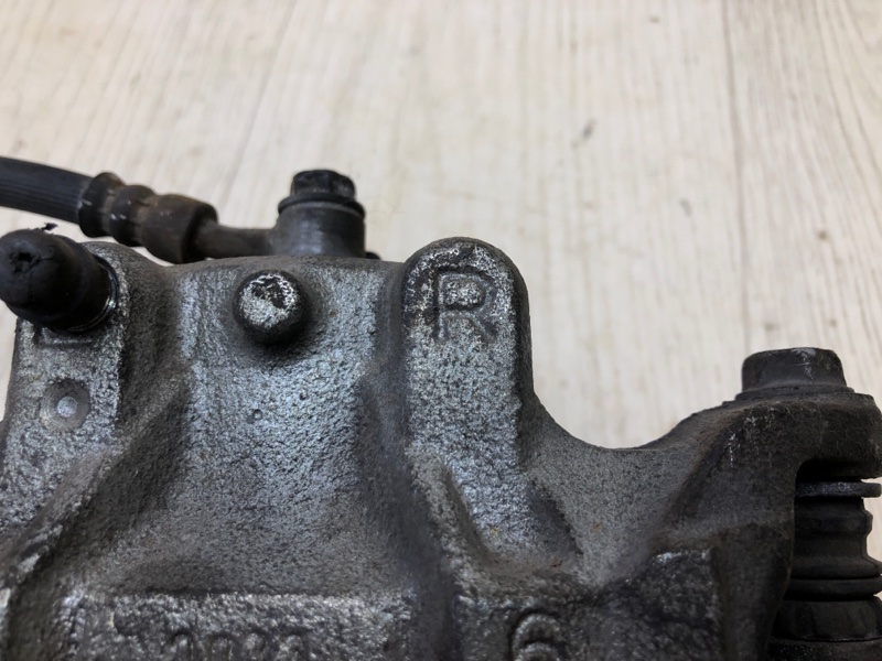 Суппорт тормозной передний правый SENTRA B17 12-21