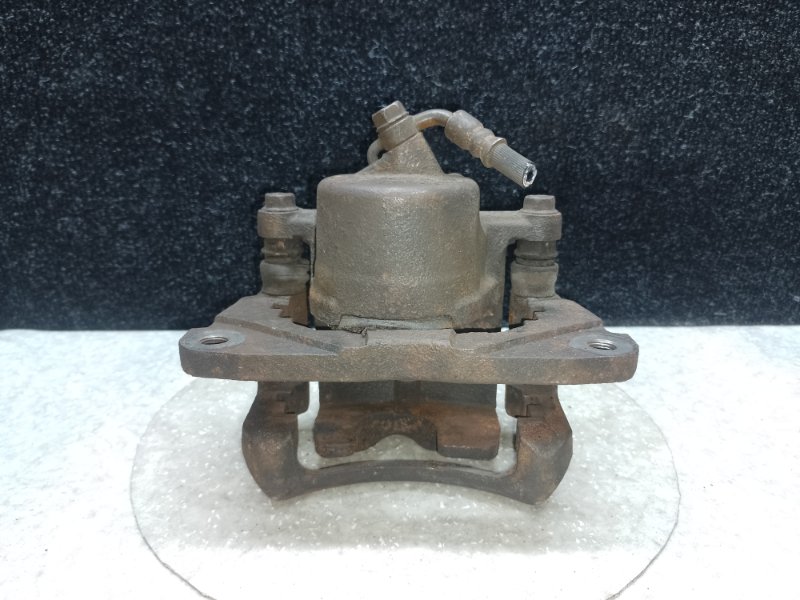 Суппорт тормозной передний правый RAV4 00-05