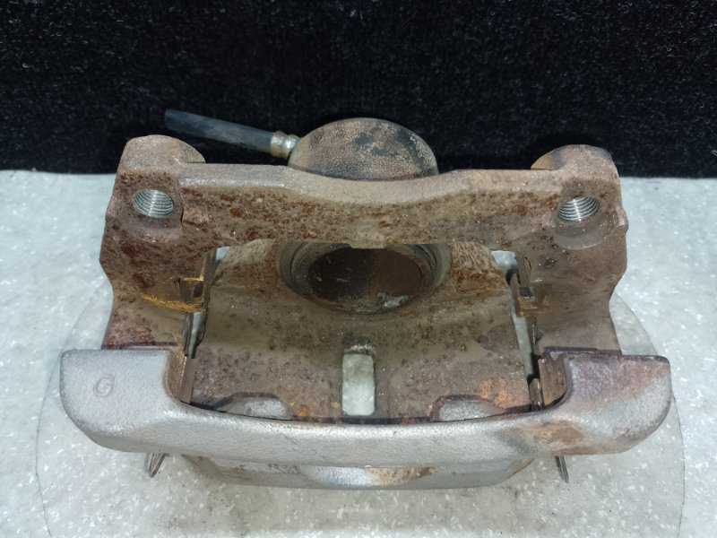 Суппорт тормозной передний левый NISSAN X-TRAIL/ROGUE T32 13-20