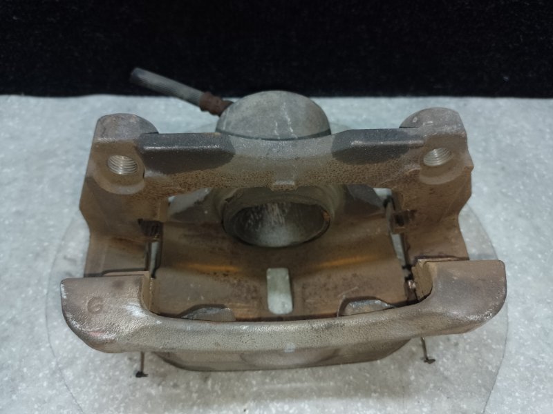 Суппорт тормозной передний левый NISSAN X-TRAIL/ROGUE T32 13-20