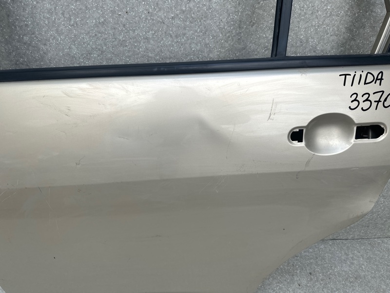 Дверь задняя левая TIIDA/VERSA C11 04-11