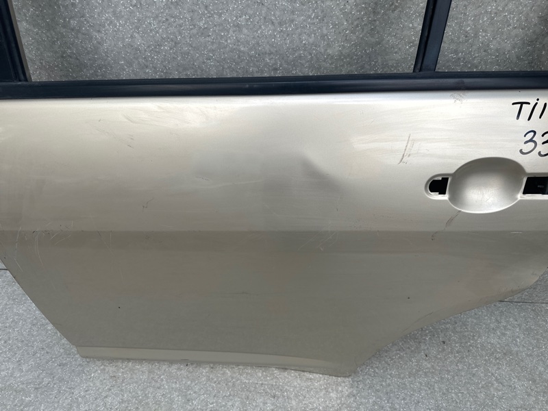 Дверь задняя левая TIIDA/VERSA C11 04-11