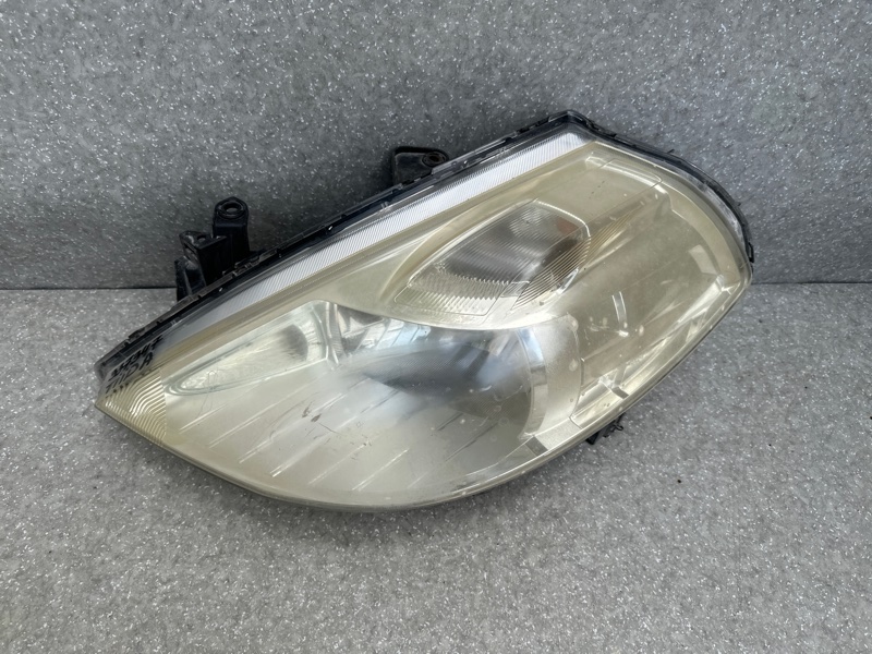 Фара левая TIIDA/VERSA C11 04-11 Фара левая TIIDA/VERSA C11 04-11