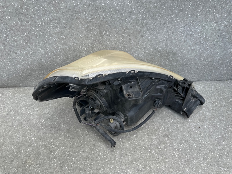 Фара левая TIIDA/VERSA C11 04-11 Фара левая TIIDA/VERSA C11 04-11