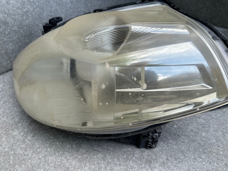 Фара левая TIIDA/VERSA C11 04-11 Фара левая TIIDA/VERSA C11 04-11