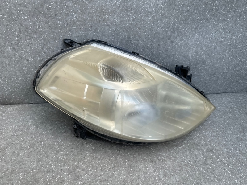 Фара правая NISSAN TIIDA/VERSA C11 04-11