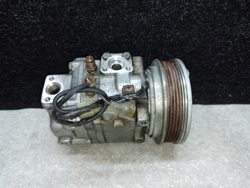 Запчасть компрессор кондиционера TOYOTA COROLLA E90 87-91 8832012670 Б/У Компрессор кондиционера TOYOTA COROLLA E90 87-91 8832012670 Б/У