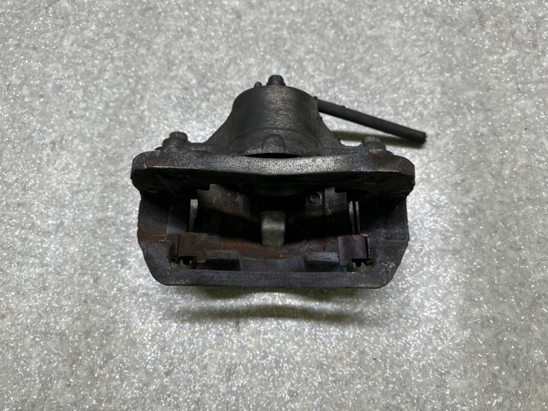 Суппорт тормозной передний левый ELANTRA HD 06-11